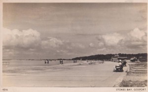 Stokes Bay Beach with three remaining dolphins at Hard G3, posted in 1956.